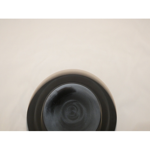 105 - Ebonised overlaid pedestal bowl.