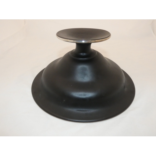 105 - Ebonised overlaid pedestal bowl.