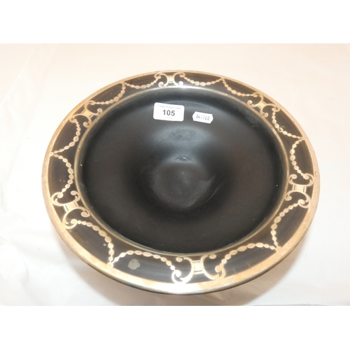 105 - Ebonised overlaid pedestal bowl.