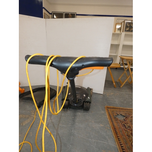 185 - Garden rotovator and a Black & Decker strimmer.