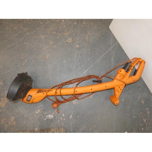 185 - Garden rotovator and a Black & Decker strimmer.