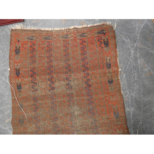 187 - North West Persian Kurdish rug and a Belouch rug (both with wear and tears).&nbsp; (2)