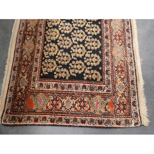 192 - Small Persian Heriz hand-knotted rug.