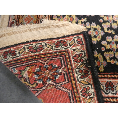 192 - Small Persian Heriz hand-knotted rug.