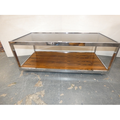 196 - Retro chrome coffee table with veneered base and glass top.
