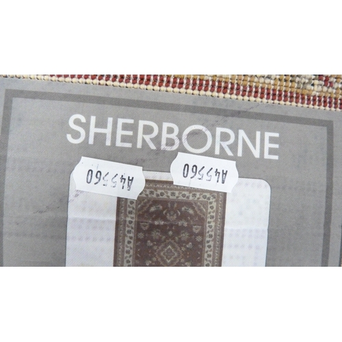 206 - Modern Sherborne Persian design rug.