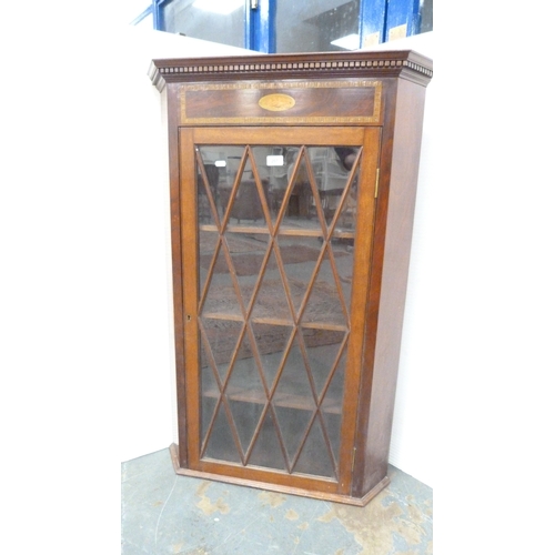 207 - 19th century inlaid mahogany corner cabinet with astragal glazed door.