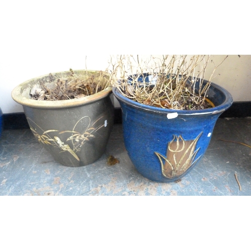 211 - Blue glazed garden planter with floral decoration and a similar green glazed garden planter.&nbsp; (... 