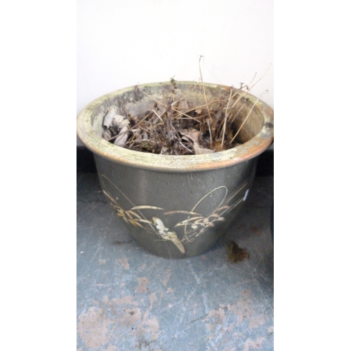 211 - Blue glazed garden planter with floral decoration and a similar green glazed garden planter.&nbsp; (... 