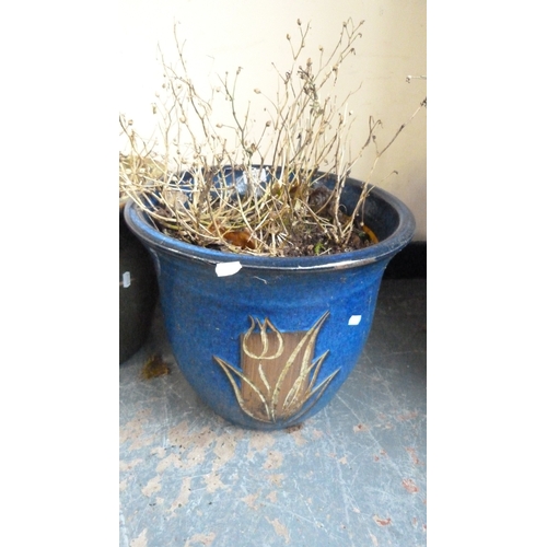 211 - Blue glazed garden planter with floral decoration and a similar green glazed garden planter.&nbsp; (... 