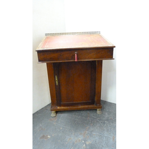 214 - Victorian mahogany davenport with brass gallery rail and animal paw feet.