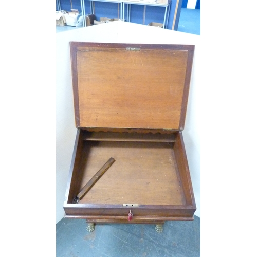 214 - Victorian mahogany davenport with brass gallery rail and animal paw feet.