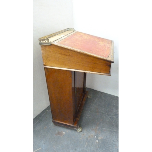 214 - Victorian mahogany davenport with brass gallery rail and animal paw feet.