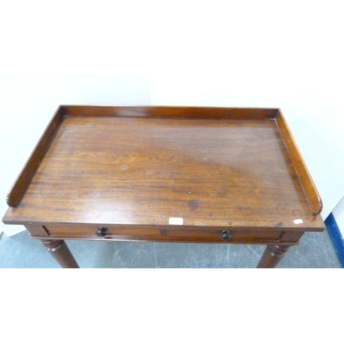 215 - Victorian mahogany two-drawer writing desk with three-quarter gallery.