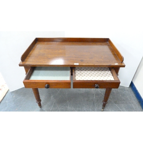215 - Victorian mahogany two-drawer writing desk with three-quarter gallery.