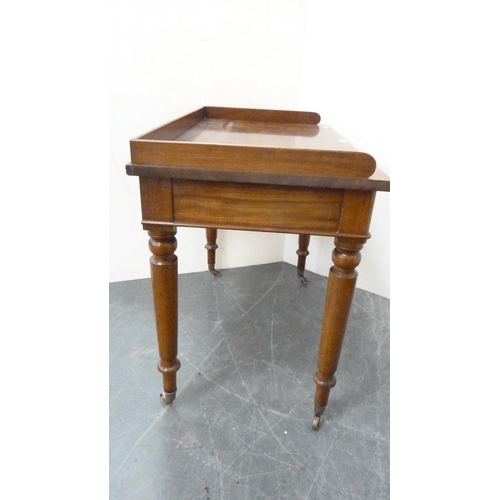 215 - Victorian mahogany two-drawer writing desk with three-quarter gallery.