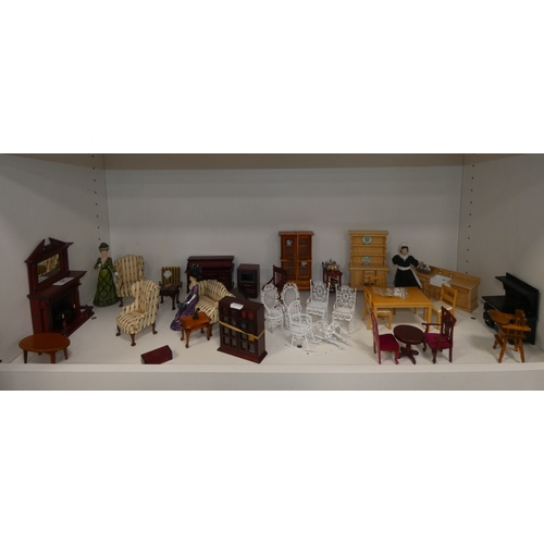 64 - Collection of doll's house furniture to include a rolltop desk, dressers, display cabinet, stove, ta... 