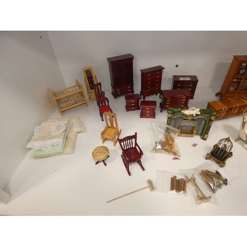 65 - Collection of doll's house furniture to include antique-style examples, Chippendale-style chest of d... 