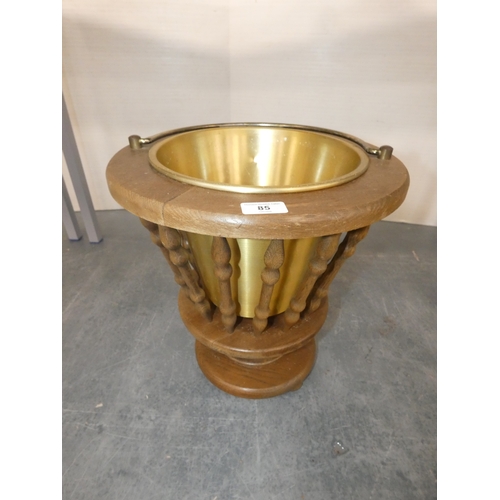 85 - Victorian-style jardinière with gilt insert.