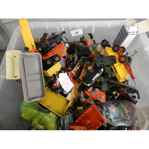 88 - Carton containing a large collection of playworn diecast models to include Matchbox and others, also... 