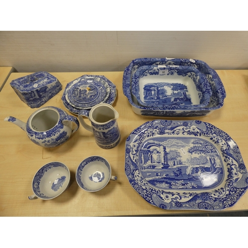 92 - Group of Spode 'Italian' pattern tablewares to include serving dishes, ashet, cups etc.