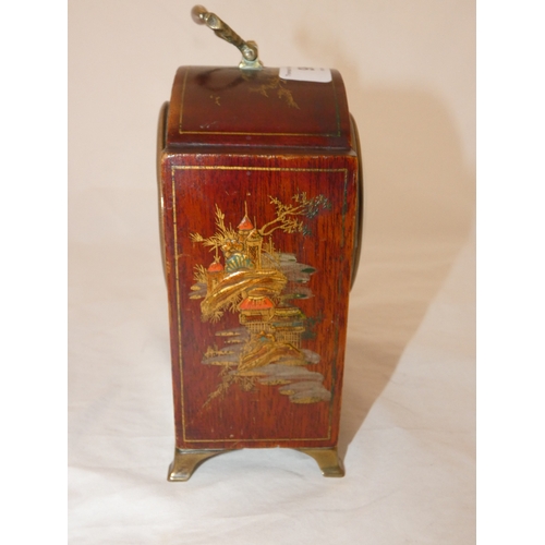 98 - Asprey chinoiserie mantel clock with gilt feet and handle. Height approx. 17cms.