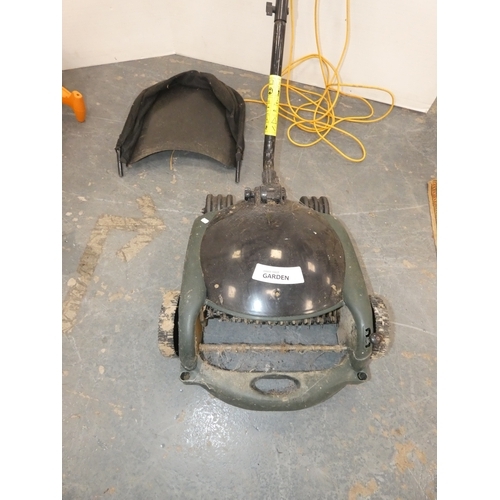 185 - Garden rotovator and a Black & Decker strimmer.