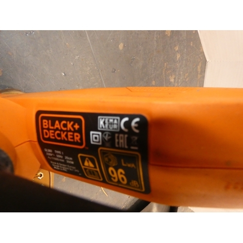 185 - Garden rotovator and a Black & Decker strimmer.