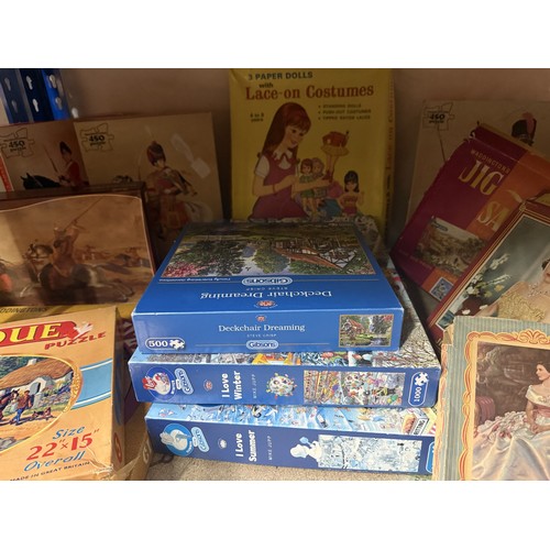 229 - Jigsaws to include vintage royal commemorative jigsaws, Gibsons jigsaws, etc. along with vintage boa... 
