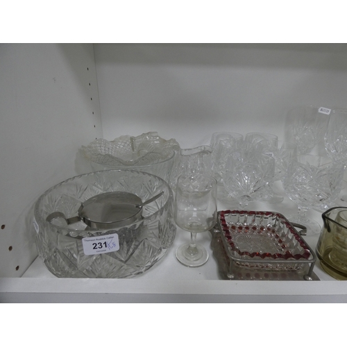 231 - Cut crystal and glassware to include bowls, glasses, decanter etc (one shelf).