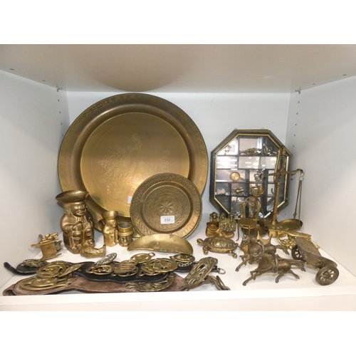 232 - Brassware to include charger, horse brasses, balance scales, animal figures, horse and chariot, and ... 