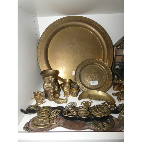 232 - Brassware to include charger, horse brasses, balance scales, animal figures, horse and chariot, and ... 