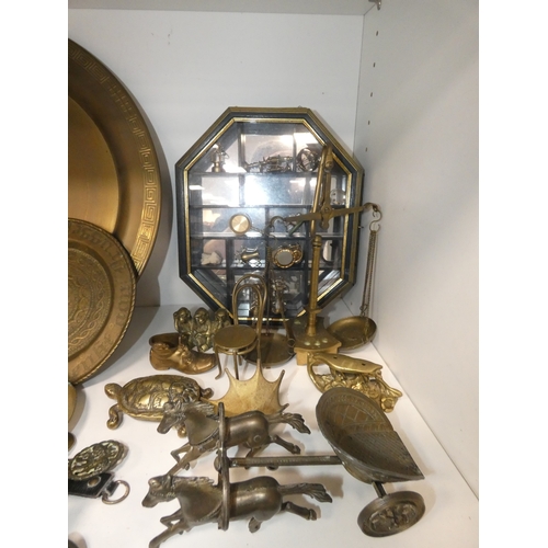 232 - Brassware to include charger, horse brasses, balance scales, animal figures, horse and chariot, and ... 