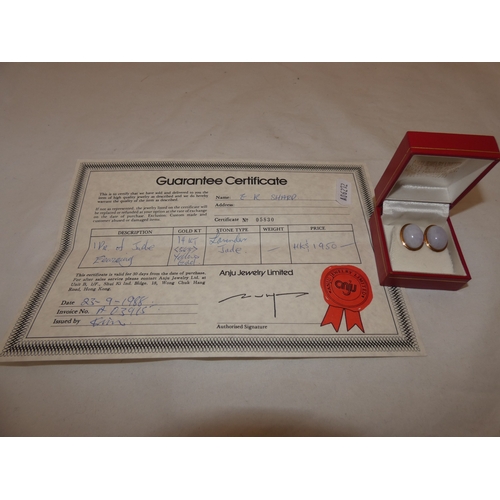 237 - Pair of 14kt gold and lavender jade earrings, with guarantee certificate, 6.5g gross.