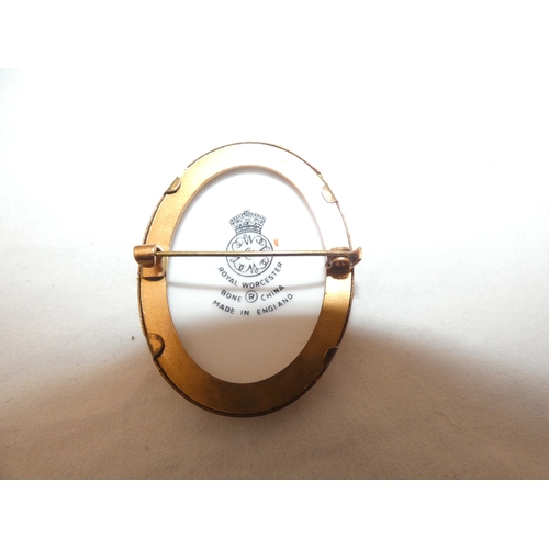 239 - Royal Worcester brooch decorated with a floral spray, Jorgen Jensen of Denmark modernist brooch with... 