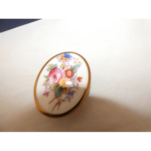 239 - Royal Worcester brooch decorated with a floral spray, Jorgen Jensen of Denmark modernist brooch with... 