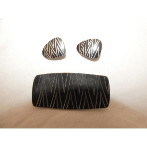 239 - Royal Worcester brooch decorated with a floral spray, Jorgen Jensen of Denmark modernist brooch with... 