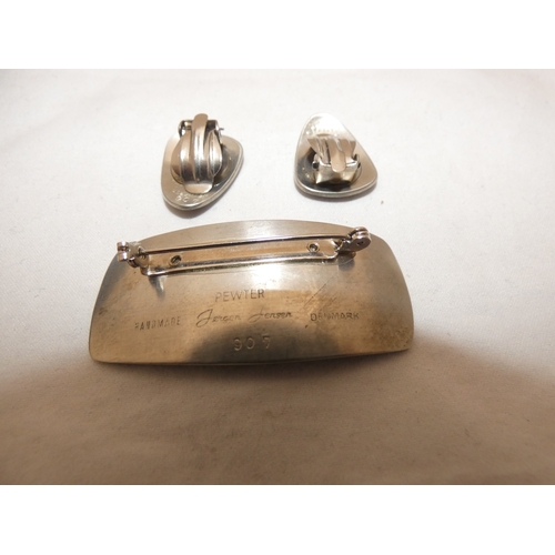 239 - Royal Worcester brooch decorated with a floral spray, Jorgen Jensen of Denmark modernist brooch with... 