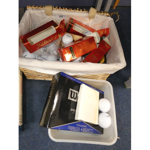 256 - Quantity of golf balls, golfing books, prints and pictures, spanners and accessories.