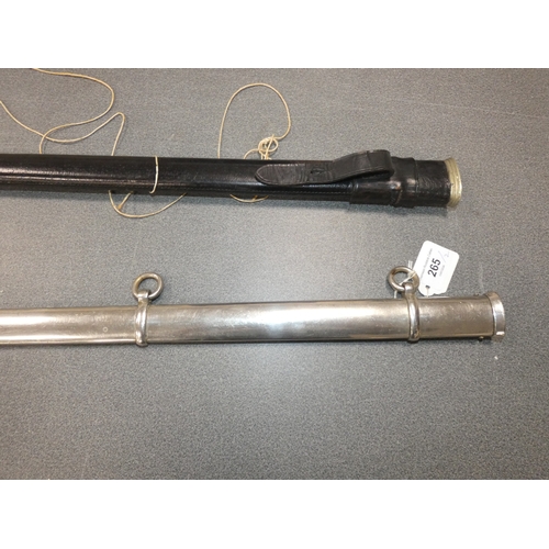 265 - Two sword scabbards, one tooled, the other metal.&nbsp; (2)