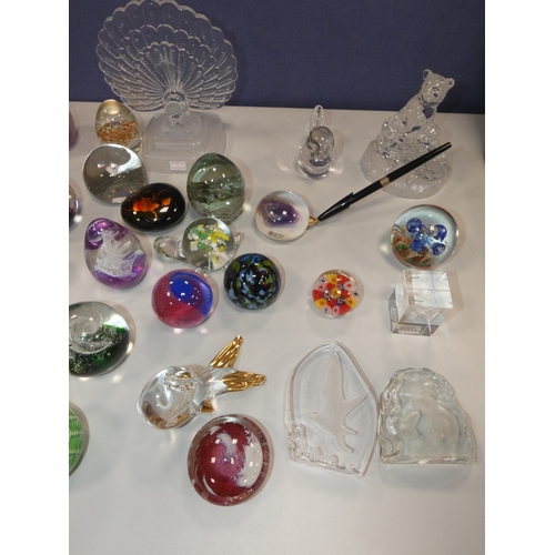 289 - Collection of art glass paperweights and modern glass animal figures.