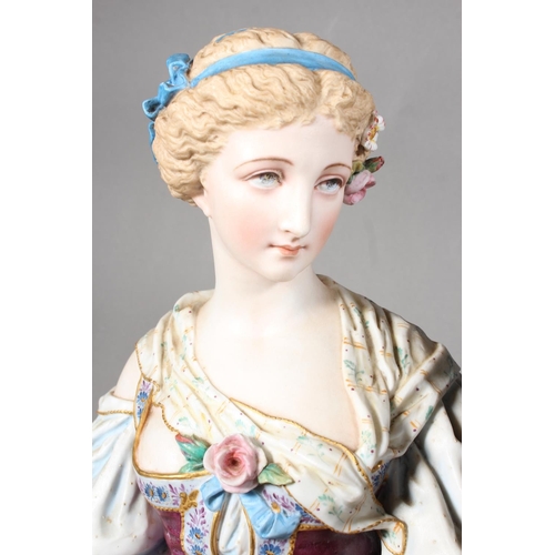 211 - Large pair of 19th century porcelain figures, the male modelled holding a pair of doves, the female ... 