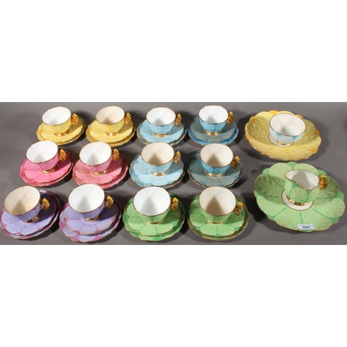 204 - Aynsley B1791 floral pattern forty piece part tea set with butterfly handles. (40)