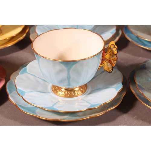 204 - Aynsley B1791 floral pattern forty piece part tea set with butterfly handles. (40)