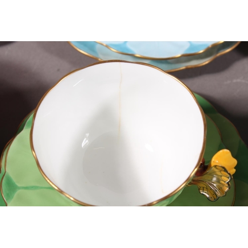 204 - Aynsley B1791 floral pattern forty piece part tea set with butterfly handles. (40)