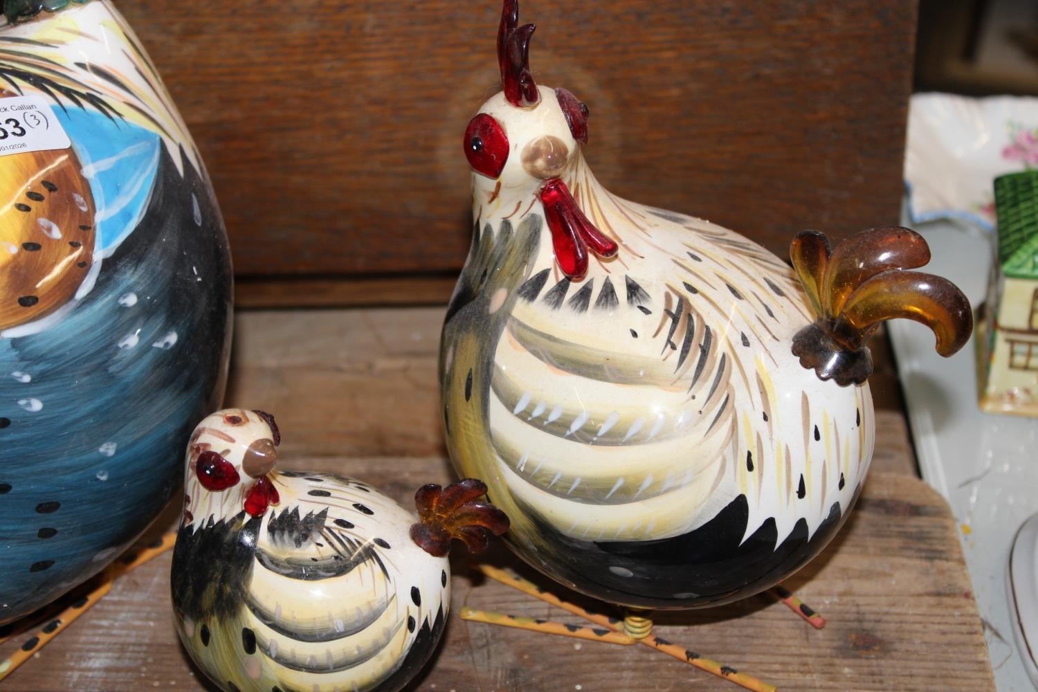 Three rocking roosters by Galla. (3)