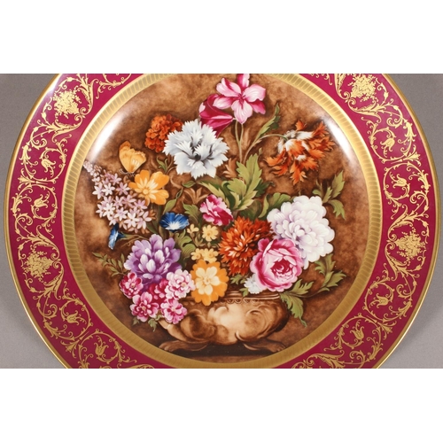 209 - Kaiser of West Germany, a large porcelain charger dish with central bowl of flowers vignette after C... 