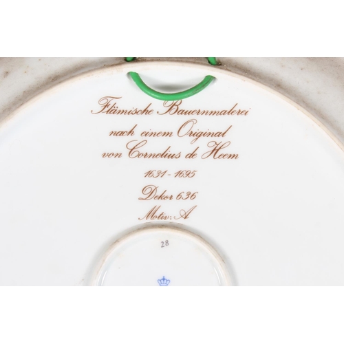209 - Kaiser of West Germany, a large porcelain charger dish with central bowl of flowers vignette after C... 