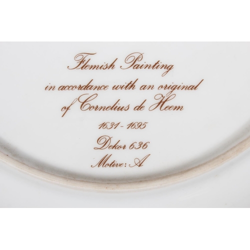 209 - Kaiser of West Germany, a large porcelain charger dish with central bowl of flowers vignette after C... 