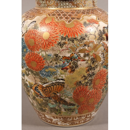 210 - Japanese Satsuma baluster jar and cover, the body decorated with butterflies and chrysanthemums, six... 